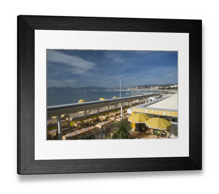 Framed Print : Restaurants on the beach walk area of Cannes, France Framed Print : Restaurants on the beach walk area of Cannes, France