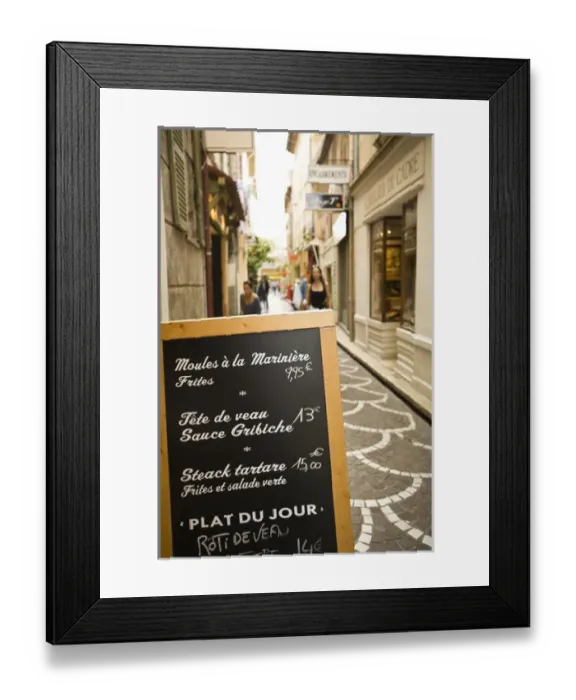 Framed Print : Menu sign on colorful street area of Antibes, France Framed Print : Menu sign on colorful street area of Antibes, France