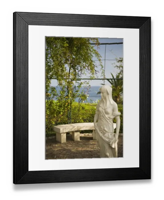 Framed Print : small statue in rose garden. Coast of France between Villefranche and Monaco Framed Print : small statue in rose garden. Coast of France between Villefranche and Monaco