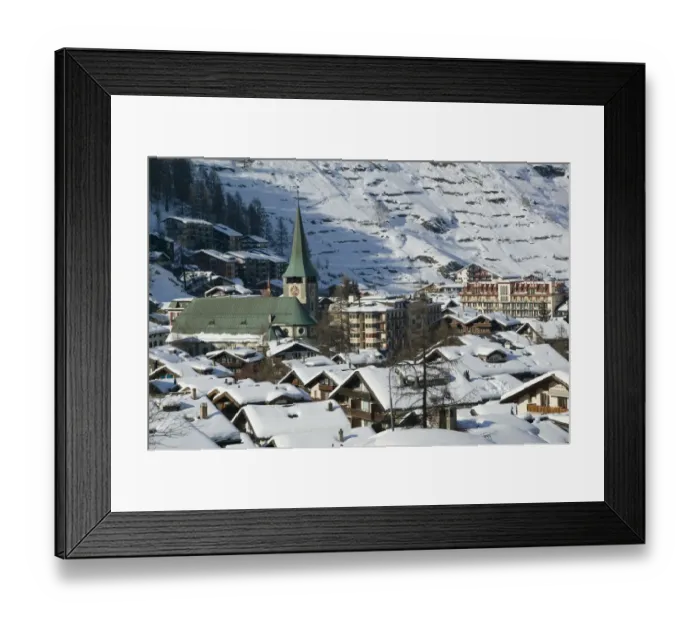 Framed Print : SWITZERLAND-Wallis / Valais-ZERMATT: Town View & Parish Church from the West / Winter Framed Print : SWITZERLAND-Wallis / Valais-ZERMATT: Town View & Parish Church from the West / Winter