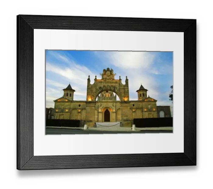 Framed Print : Chateau Cos d Estournel, the gate and the facade at dusk with flood lights floodlit blue sky Framed Print : Chateau Cos d Estournel, the gate and the facade at dusk with flood lights floodlit blue sky
