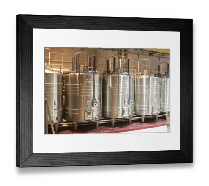 Framed Print : Stainless steel fermentation tanks with on top equipement for doing pigeage Framed Print : Stainless steel fermentation tanks with on top equipement for doing pigeage