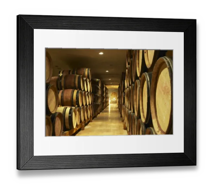 Framed Print : Wooden barrels with aging wine in the cellar of Guigal in Ampuis. Domaine E Guigal Framed Print : Wooden barrels with aging wine in the cellar of Guigal in Ampuis. Domaine E Guigal