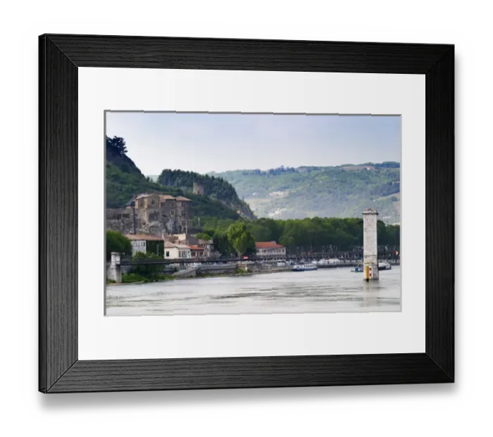 Framed Print : The Chateau de Tournon in the town Tournon and in the background a tower in ruins Framed Print : The Chateau de Tournon in the town Tournon and in the background a tower in ruins