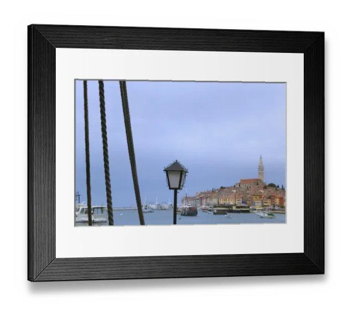 Framed Print : Cityscape of Rovinj dominated by Cathedral of St Euphemia by Adriatic Sea, Istria Framed Print : Cityscape of Rovinj dominated by Cathedral of St Euphemia by Adriatic Sea, Istria
