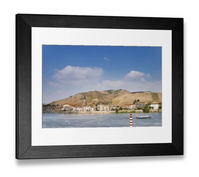 Framed Print : The town Tain l Hermitage, the riverside side, the river Rhone. A sailing boat on the water