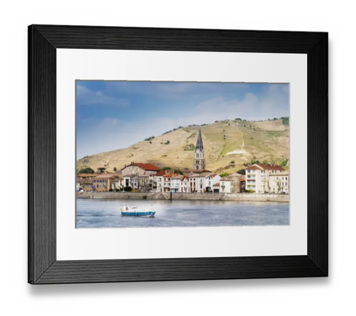Framed Print : The town Tain l Hermitage, the riverside side, the river Rhone. A sailing boat on the water Framed Print : The town Tain l Hermitage, the riverside side, the river Rhone. A sailing boat on the water
