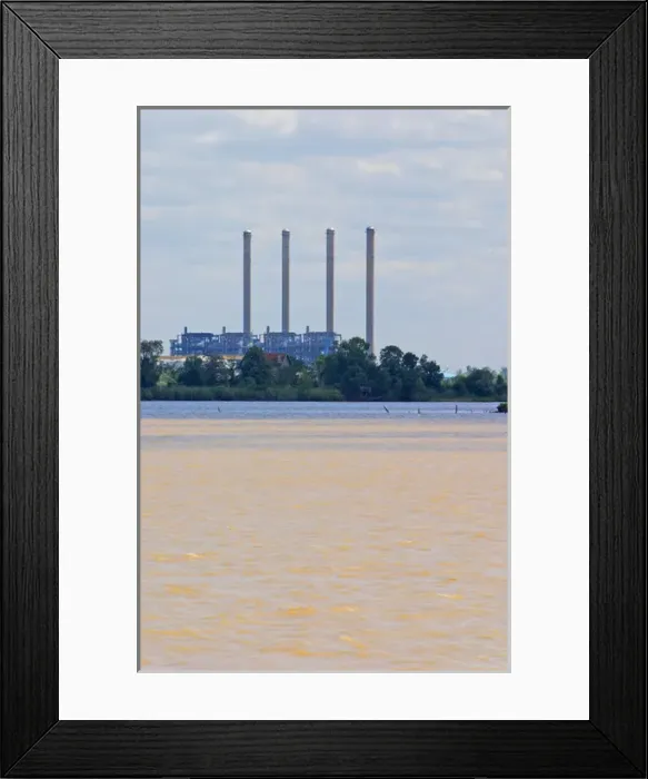 Framed Print : A view from Bourg across the Dordogne river of the oil refinery industrial plant Framed Print : A view from Bourg across the Dordogne river of the oil refinery industrial plant