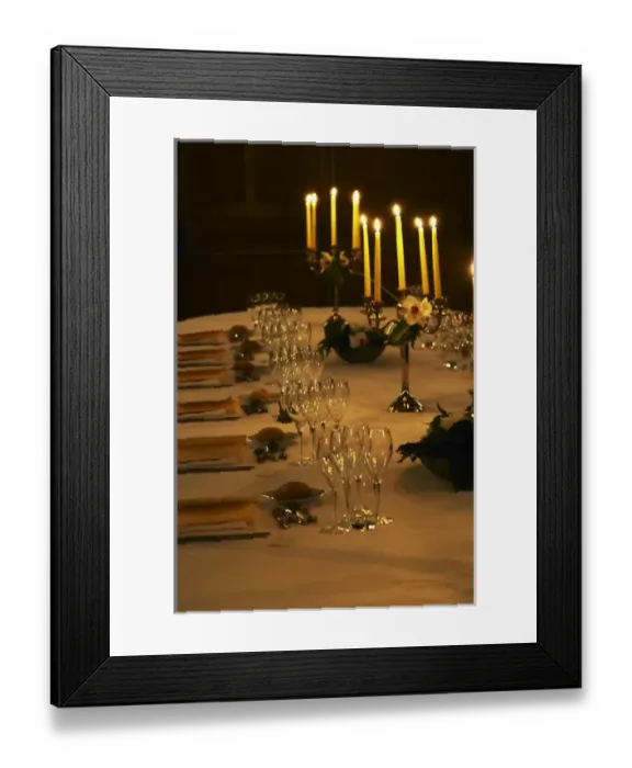 Framed Print : A romantic table set for wine tasting and dinner with many glasses and candelabra