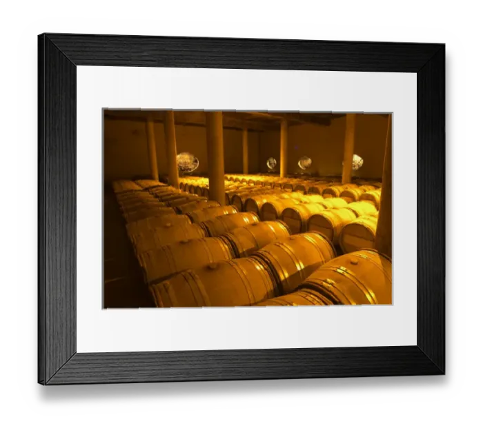 Framed Print : The very dramatic newly built underground barrel aging cellar under the winery, with Framed Print : The very dramatic newly built underground barrel aging cellar under the winery, with