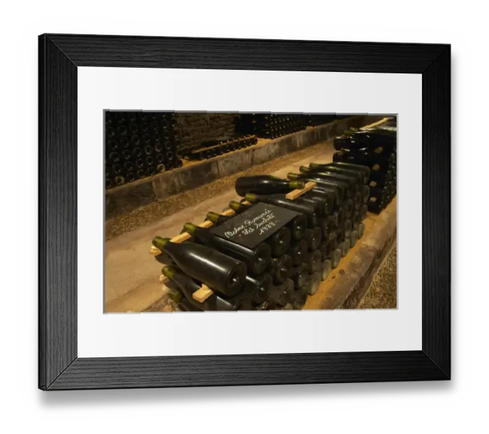 Framed Print : In the underground wine cellar: a pile of bottles of Vosne Romanee Romanee Les Suchots Framed Print : In the underground wine cellar: a pile of bottles of Vosne Romanee Romanee Les Suchots