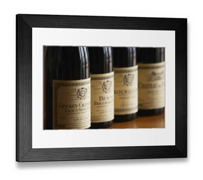 Framed Print : A row of bottles and labels of burgundy wine from maison Louis Jadot Gevrey Chamberting