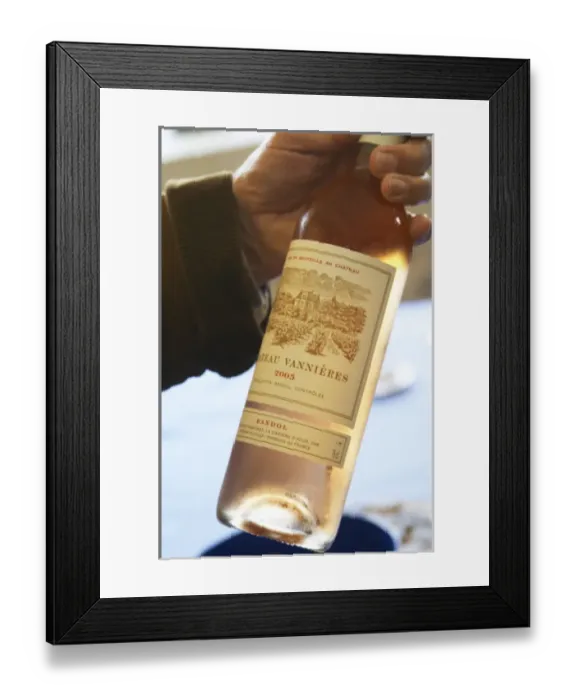 Framed Print : Bottle of rose wine 2005 in a hand Chateau Vannieres (Vannieres) La Cadiere (Cadiere)