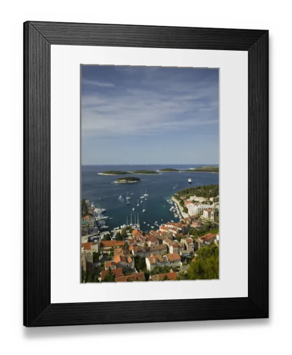 Framed Print : CROATIA, Southern Dalmatia, Hvar Island, Hvar Town. Hvar Yacht Harbor from Fortress