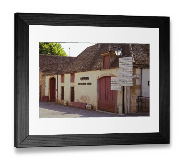 Framed Print : The Pommard village, with wine shop and many signs indicating several wine producers