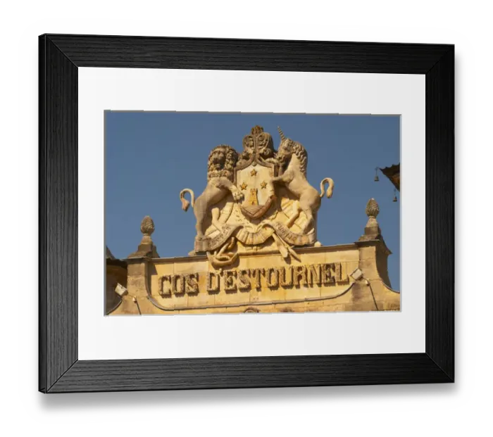Framed Print : The entrance portico to the elaborately decorated winery with text and coat of arms showing a tower Framed Print : The entrance portico to the elaborately decorated winery with text and coat of arms showing a tower