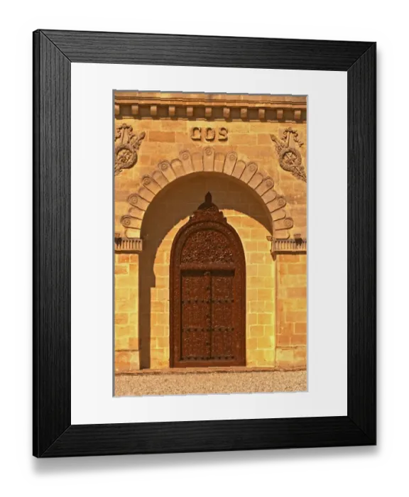 Framed Print : The entrance door to the elaborately decorated winery at Cos d Estournel in oriental style