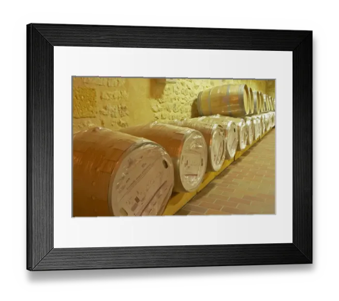 Framed Print : in the wine cellar: new Barriques barrels in their original packaging - Chateau Grand Mayne