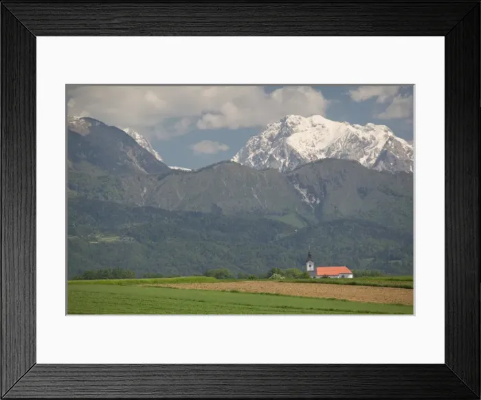 Framed Print : SLOVENIA-GORENJSKA-Moste: Church & Field with Kamnik-Savinja Alps  /  Summer