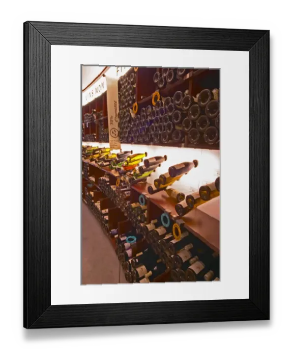 Framed Print : A curved display of bottles. Backlit The Lavinia wine shop in Paris. Probably Framed Print : A curved display of bottles. Backlit The Lavinia wine shop in Paris. Probably