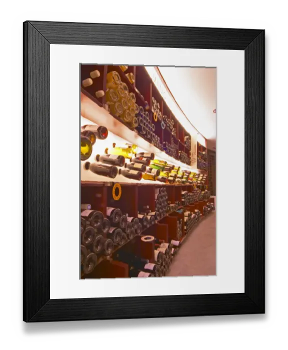 Framed Print : A curved display of bottles. Backlit The Lavinia wine shop in Paris. Probably Framed Print : A curved display of bottles. Backlit The Lavinia wine shop in Paris. Probably