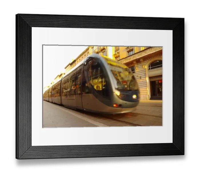 Framed Print : The new modern tram on the posh shopping street Cours de l Intendence in Bordeaux Framed Print : The new modern tram on the posh shopping street Cours de l Intendence in Bordeaux