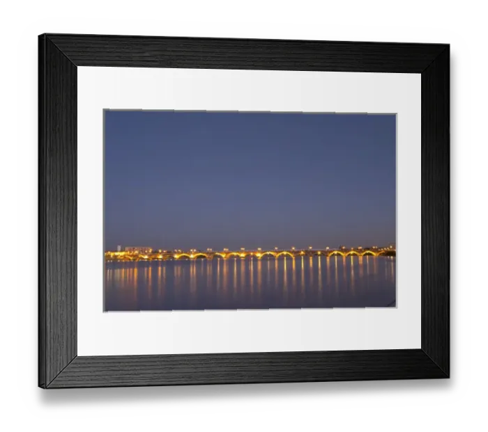 Framed Print : The old Pont de Pierre bridgeat night with reflections in Bordeaux on the Garonne