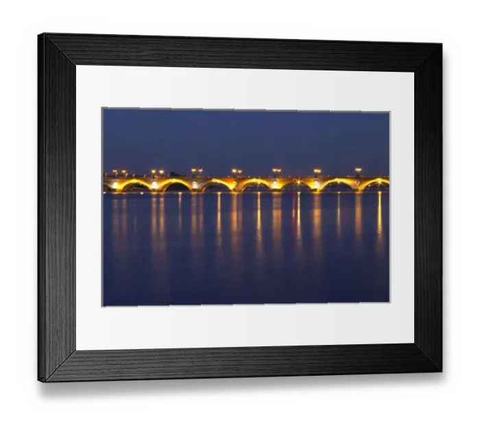 Framed Print : The old Pont de Pierre bridgeat night with reflections in Bordeaux on the Garonne River Framed Print : The old Pont de Pierre bridgeat night with reflections in Bordeaux on the Garonne River