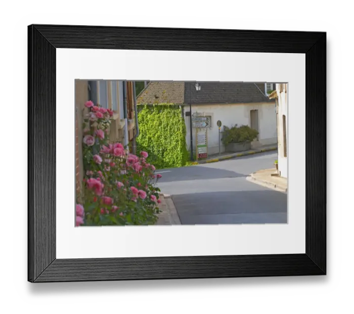 Framed Print : A street with village houses and road signs to Epernay, Cumieres and the Route de Champagne