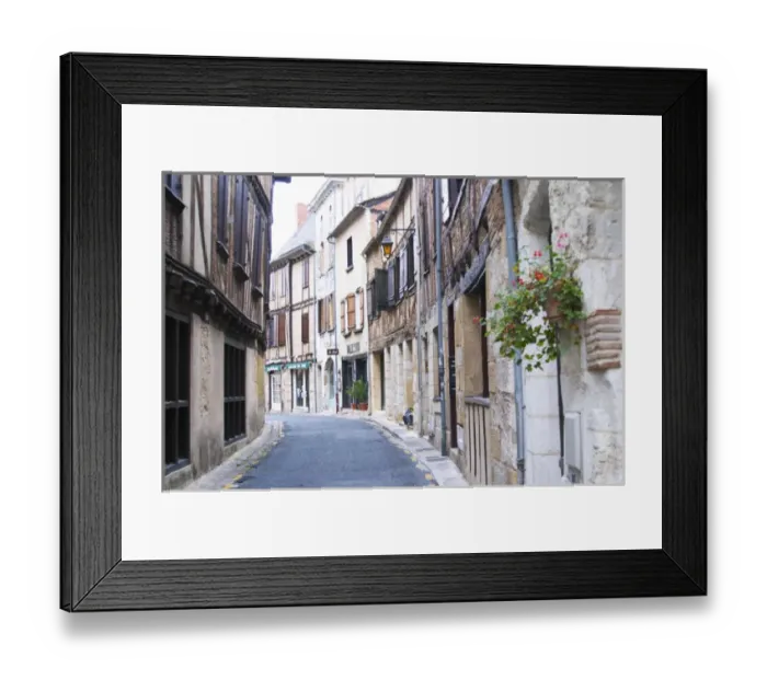 Framed Print : A curving street in the old town with old stone and wooden beam houses. Bergerac Framed Print : A curving street in the old town with old stone and wooden beam houses. Bergerac