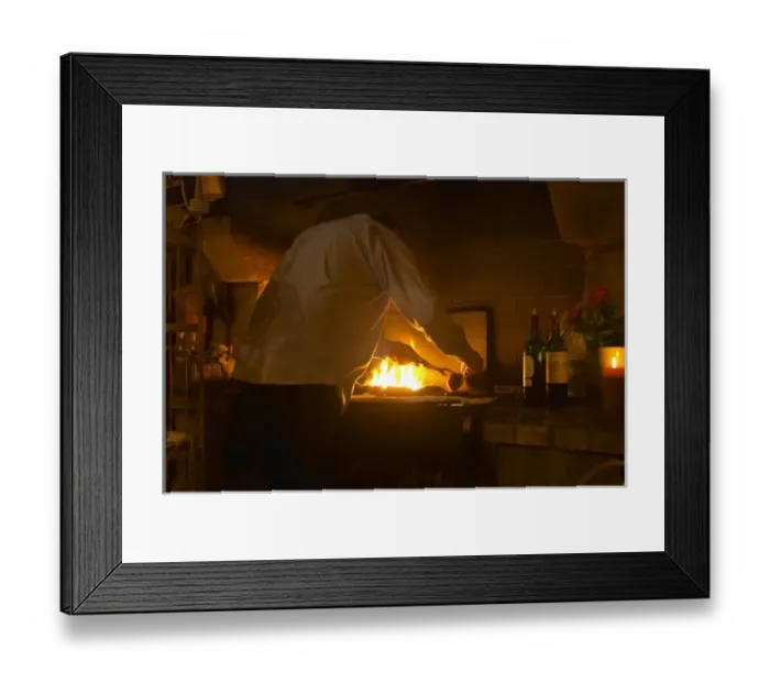 Framed Print : The fireplace used for preparing food, with ducks breasts being grilled Framed Print : The fireplace used for preparing food, with ducks breasts being grilled