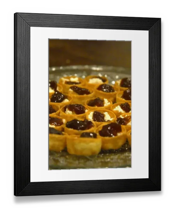 Framed Print : Mini bouchees canapees croustades filo tartlets filled with French goat cheese chevre