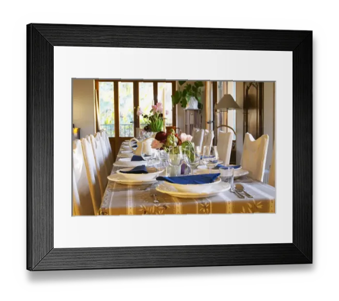 Framed Print : The dining room table decorated and set with flowers and decorative vegetables for dinner guests Framed Print : The dining room table decorated and set with flowers and decorative vegetables for dinner guests