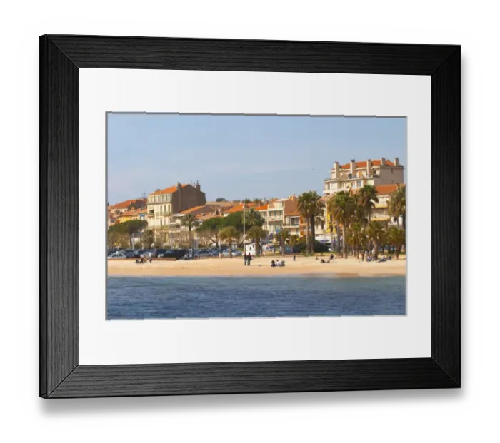 Framed Print : The beach with palm trees and houses along the coast in Bandol. Bandol Cote daaAzur Framed Print : The beach with palm trees and houses along the coast in Bandol. Bandol Cote daaAzur