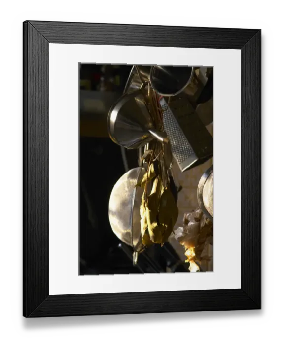 Framed Print : Kitchen utensils in stainless steel hanging on hooks in the Provence kitchen: raper Framed Print : Kitchen utensils in stainless steel hanging on hooks in the Provence kitchen: raper