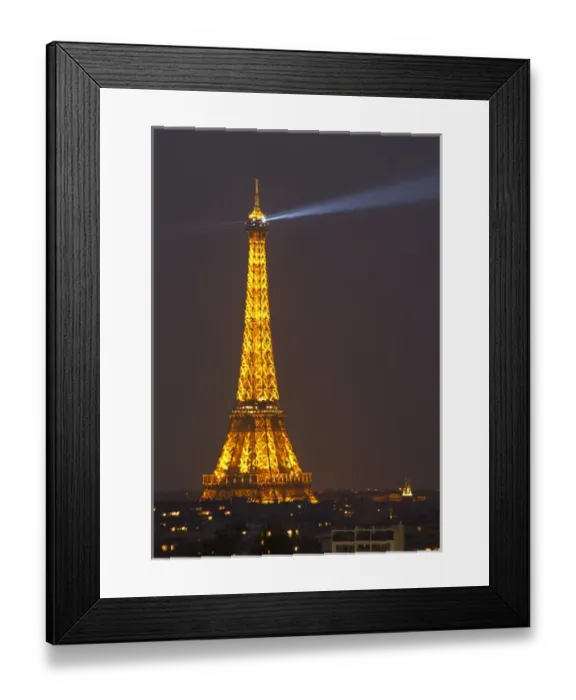 Framed Print : The Eiffel Twoer in Paris illuminated at night against a dark blue black sky, search Framed Print : The Eiffel Twoer in Paris illuminated at night against a dark blue black sky, search