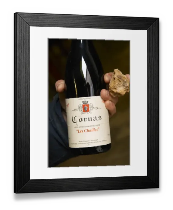 Framed Print : Alberic Mazoyer showing in his hand a bottle of Cornas les Chailles and a stone Framed Print : Alberic Mazoyer showing in his hand a bottle of Cornas les Chailles and a stone
