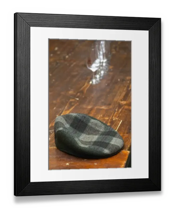 Framed Print : The emblematic cap of Alain Voge on a wooden table and some wine glasses. Alain Voge Framed Print : The emblematic cap of Alain Voge on a wooden table and some wine glasses. Alain Voge