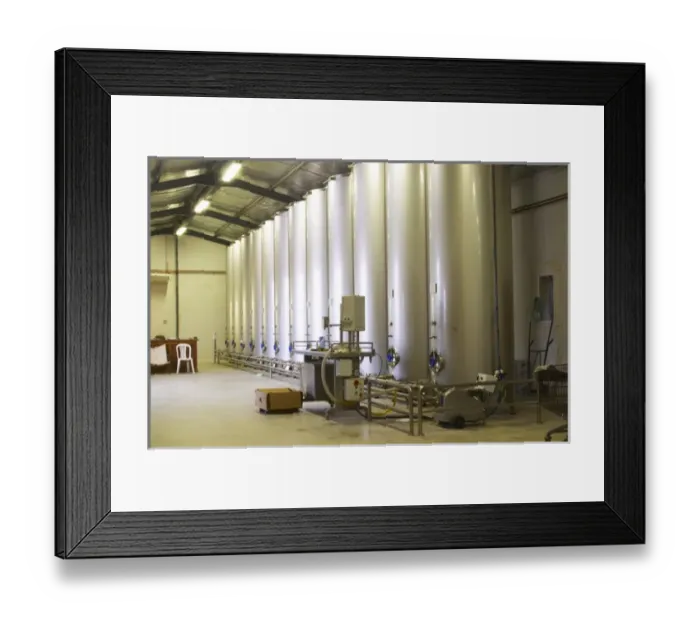 Framed Print : In the olive factory, tanks for storing olive oil. Moulin Mas des Barres olive mill