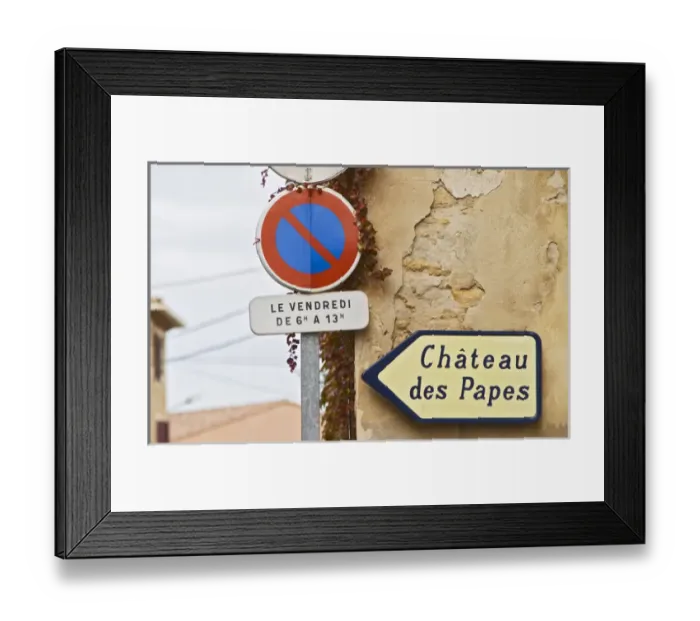 Framed Print : Road sign showing the way to the ruins of the chateu Popes old summer palace