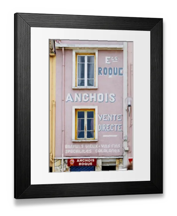 Framed Print : Etablissement Roque Anchois anchovies shop, house painted with advertising in white and pink Framed Print : Etablissement Roque Anchois anchovies shop, house painted with advertising in white and pink