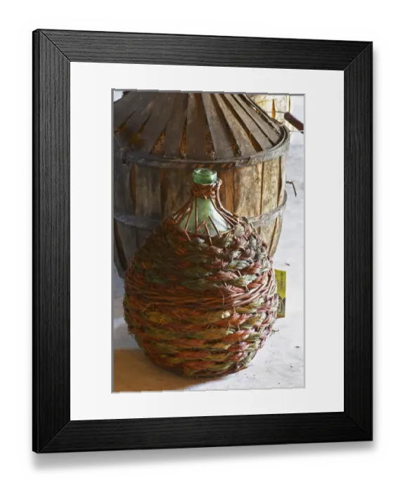 Framed Print : Chateau Rives-Blanques. Limoux. Languedoc. Demijohns with wine in wicker baskets