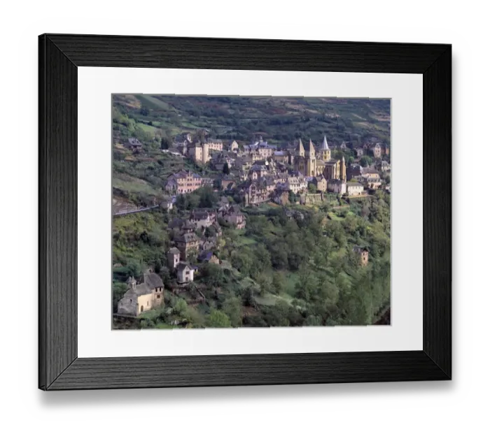 Framed Print : Europe, France, Conques. The picturesque village of Conques occupies a hillside Framed Print : Europe, France, Conques. The picturesque village of Conques occupies a hillside