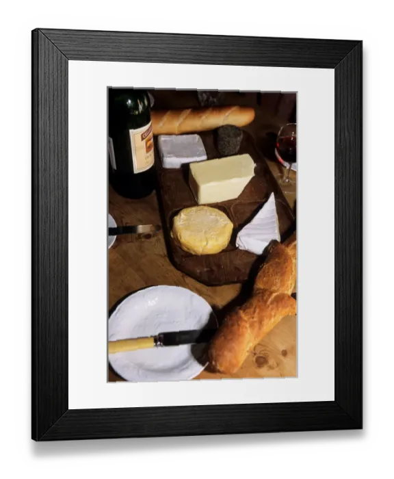 Framed Print : Brusvily, Britanny, France. Cheeses on a cheese board, bread, knife, bottle and glass Framed Print : Brusvily, Britanny, France. Cheeses on a cheese board, bread, knife, bottle and glass