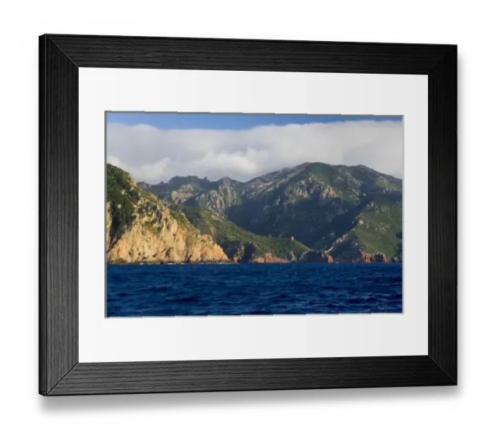 Framed Print : Corsica. France. Europe. Rugged coast near Galeria. Genoese tower visible in distance Framed Print : Corsica. France. Europe. Rugged coast near Galeria. Genoese tower visible in distance