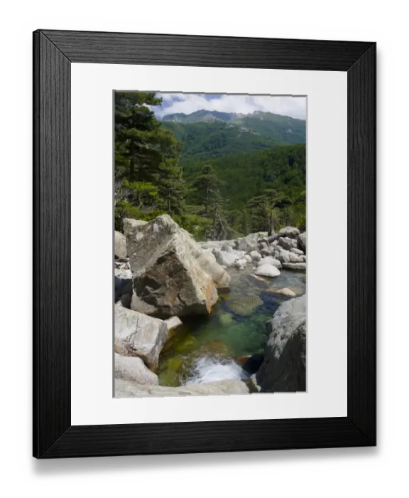 Framed Print : Corsica. France. Europe Pool of clear water & granite boulders below forest of