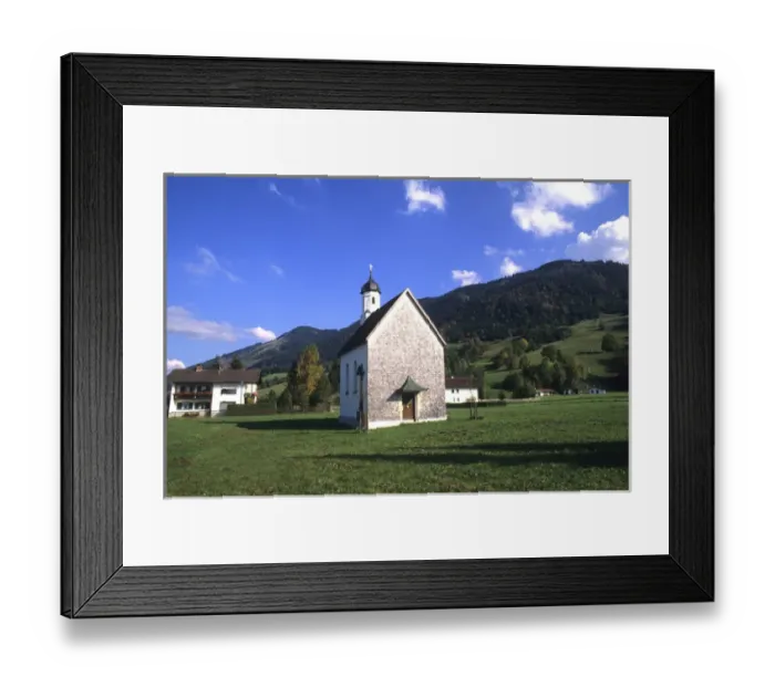 Framed Print : Church Nestled in the Mountains in Halblech Germany Framed Print : Church Nestled in the Mountains in Halblech Germany