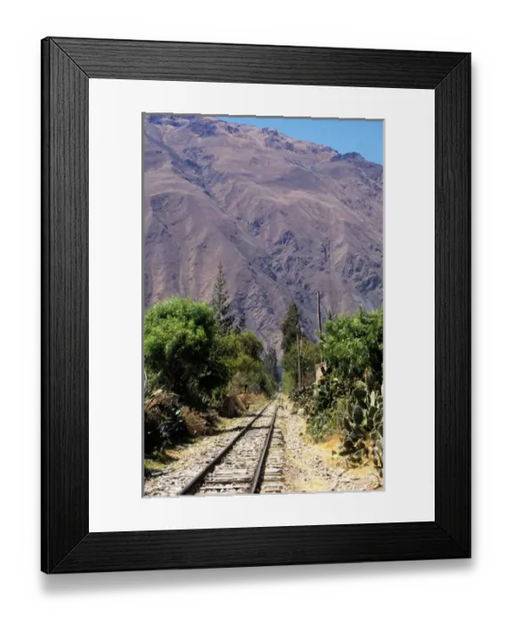 Framed Print : Urubamba Valley, Peru. Machu Pichu Railway - railway lines  /  trucks; mountains; cacti