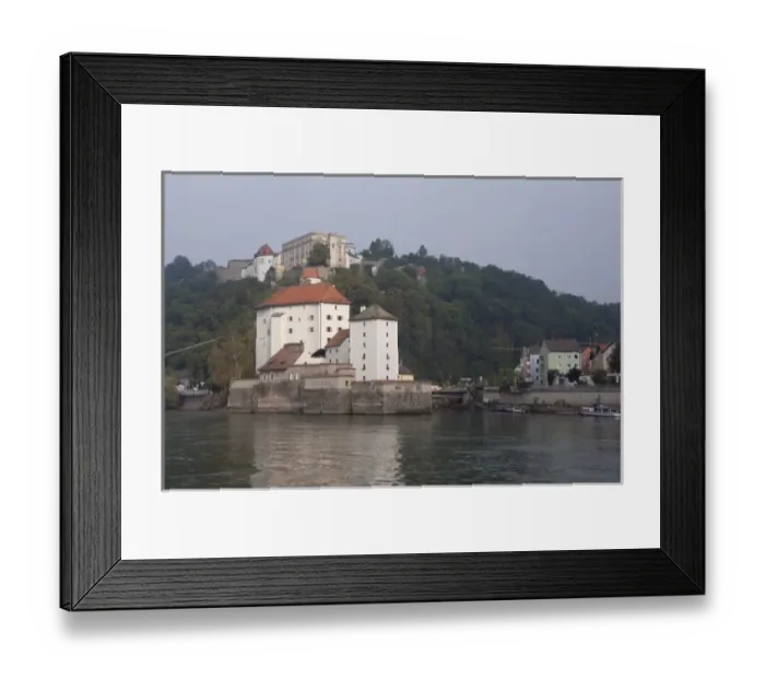 Framed Print : Germany, Passau. Confluence of Danube & Ilz rivers in front of the historic Veste Framed Print : Germany, Passau. Confluence of Danube & Ilz rivers in front of the historic Veste