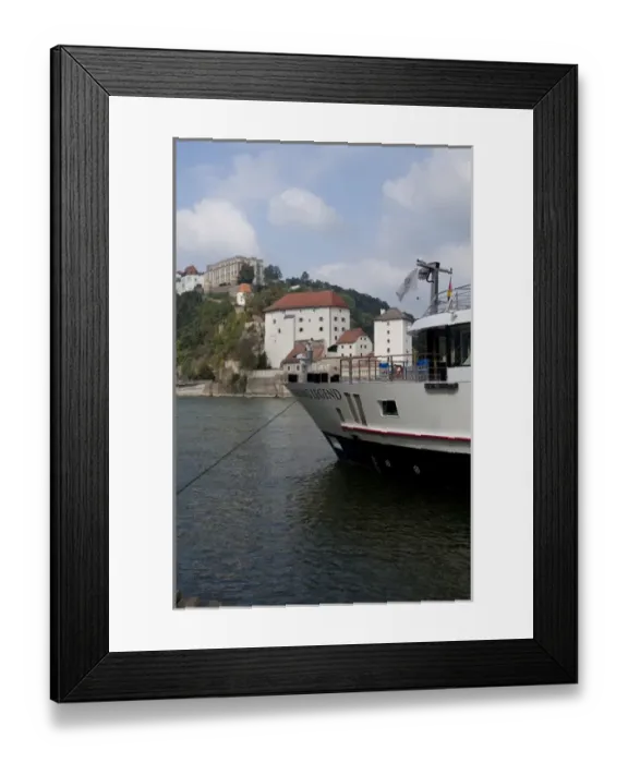 Framed Print : Germany, Passau. Viking Legend riverboat on the Danube in front of historic Framed Print : Germany, Passau. Viking Legend riverboat on the Danube in front of historic